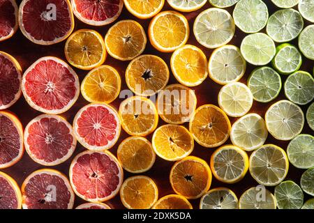 Colorful fruits backround.  citrus slices,orange, lemon, lime, and grapefruit. Top view Stock Photo