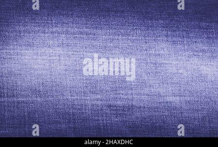 Trendy denim background toned in a 2022 color veri peri Stock Photo