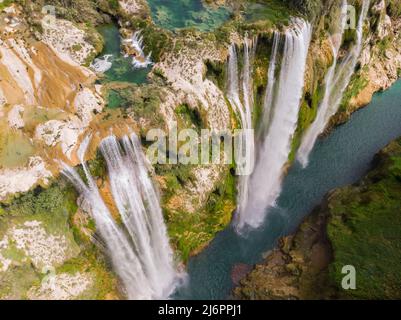 Aerial view of Beautiful Fascinating Tamul Waterfall with turquoise water in San Luis Potosi, Mexico Stock Photo