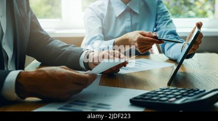 consulting services. businessman and business consultant working in office. company financial statement analysis Stock Photo