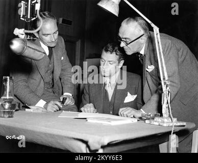 Writer CHRISTOPHER FRY Narrator LAURENCE OLIVIER and Producer CASTLETON KNIGHT during production of the Technicolor Feature Length Documentary of the Coronation of Queen Elizabeth II on 2nd June 1953 A QUEEN IS CROWNED 1953 The Rank Organisation / General Film Distributors (GFD) Stock Photo