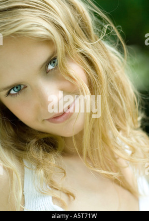 Young woman smiling, head and shoulders, portrait Stock Photo