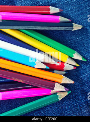 color pencils on the jeans textille Stock Photo