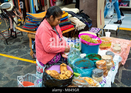 Local woman selling street food at market, San Miguel de Allende, Guanajuato, Mexico Stock Photo