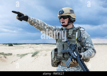 U.S. soldier in the desert during the military operation. Stock Photo