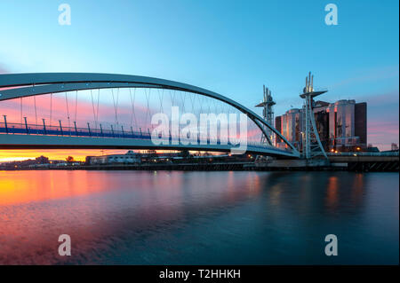 Salford Quays Lift Bridge at sunset in Manchester, England, United Kingdom, Europe Stock Photo