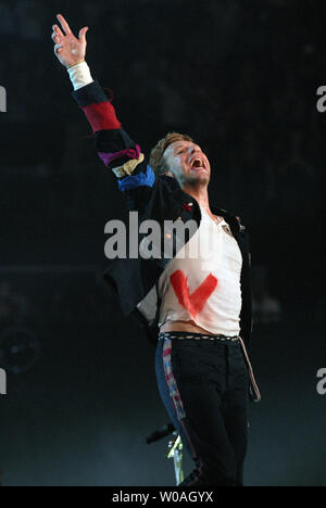 Coldplay frontman Chris Martin performs during the first of two sold-out concerts at the Air Canada Center on the first leg of the band's 'Vida La Vida' world tour stop in Toronto, Canada on July 30, 2008. (UPI Photo/Christine Chew) Stock Photo