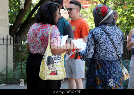 New York City, New York, USA. 14th July, 2019. Team AOC volunteers answer the emergency call of Congresswoman Alexandria Ocasio-Cortez (D-NY) to join in canvassing her migrant-heavy Parkchester, Bronx, New York district, to informed constituents about their legal rights, should they encounter U.S. Immigration and Customs Enforcement (ICE) officials during US president Donald Trump's ordered national immigration raids on 14 July 2019. Credit: G. Ronald Lopez/ZUMA Wire/Alamy Live News Stock Photo