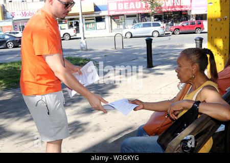 New York City, New York, USA. 14th July, 2019. Team AOC volunteers answer the emergency call of Congresswoman Alexandria Ocasio-Cortez (D-NY) to join in canvassing her migrant-heavy Parkchester, Bronx, New York district, to informed constituents about their legal rights, should they encounter U.S. Immigration and Customs Enforcement (ICE) officials during US president Donald Trump's ordered national immigration raids on 14 July 2019. Credit: G. Ronald Lopez/ZUMA Wire/Alamy Live News Stock Photo