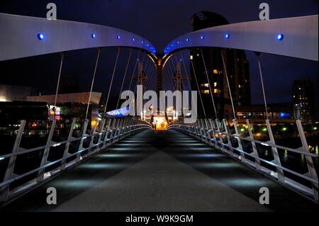 Night view of The Lowry Bridge over the Manchester Ship Canal, Salford Quays, Greater Manchester, England, United Kingdom, Europe Stock Photo