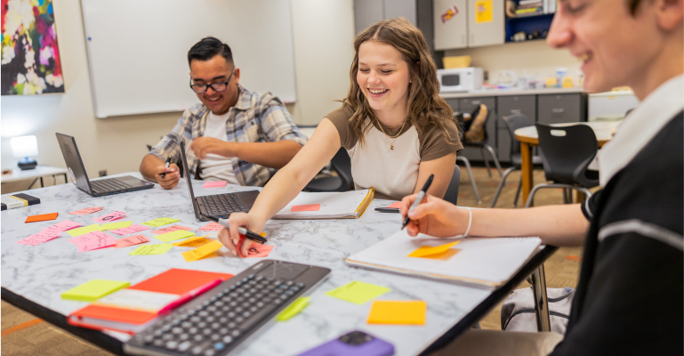 Students working at a desk