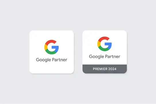 Two Google badges showing the difference between the Google Partners and Google Premier Partners badges.