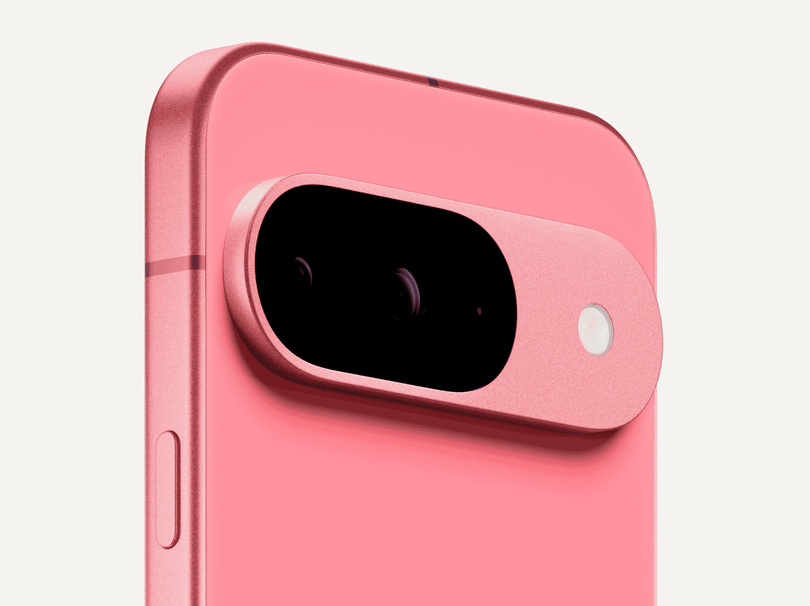 Angled close-up on the back of a Pixel 9 in Peony color.