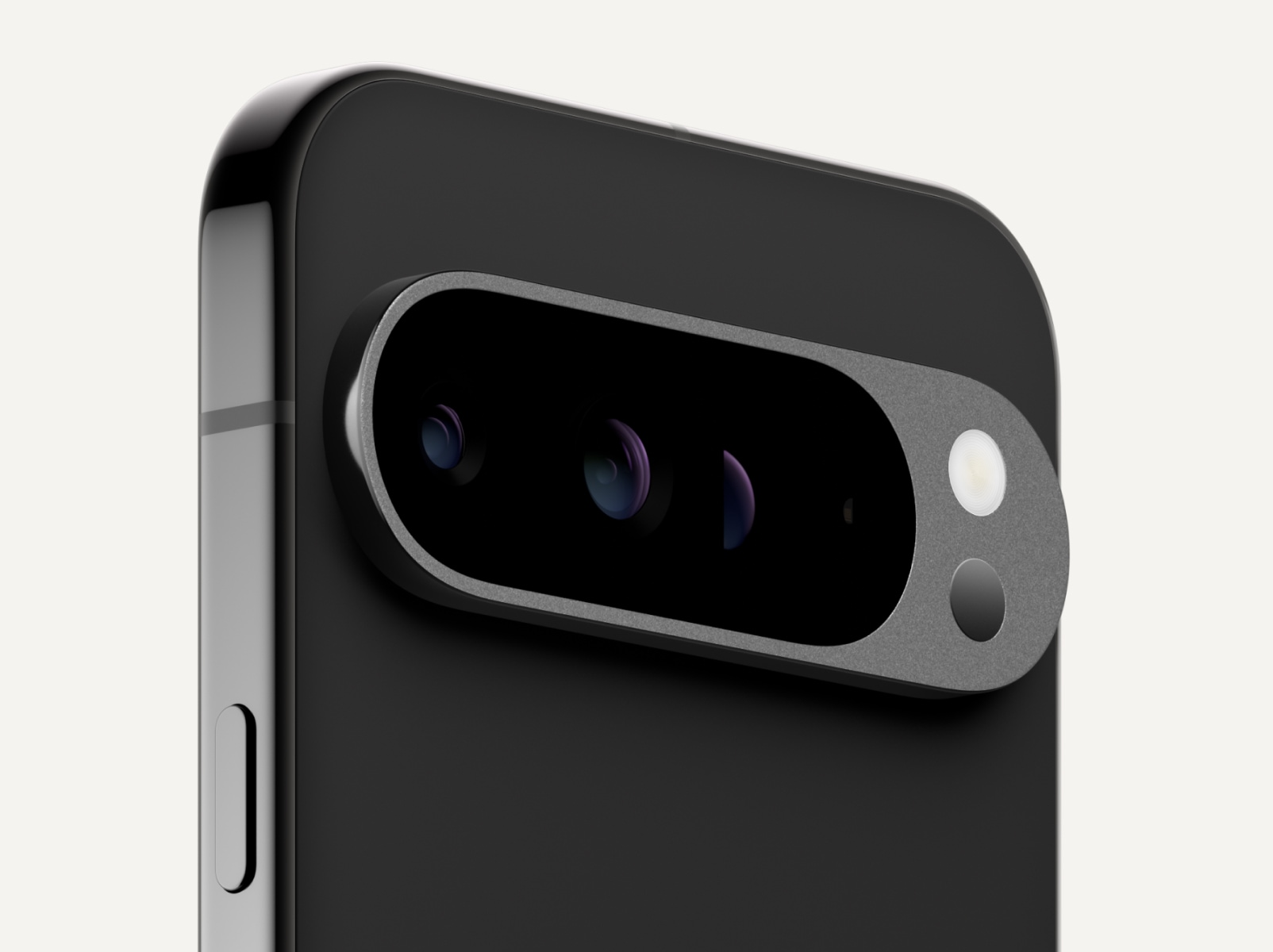 Angled close-up of the back of Pixel 9 Pro XL in Obsidian color.