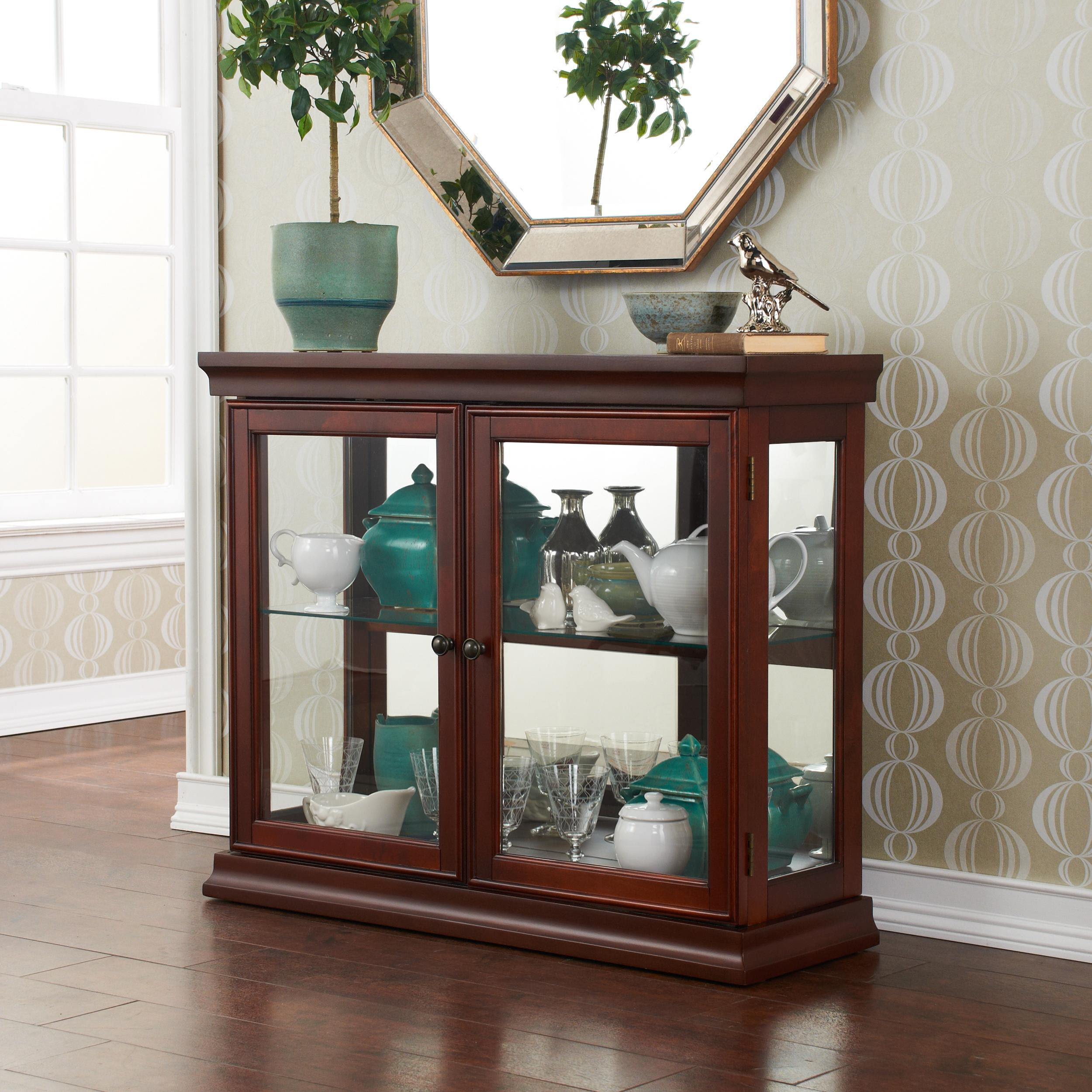 Amazon.com - SEI Mahogany Curio Cabinet with Double ... The most common curio cabinet with glass doors material is wood.