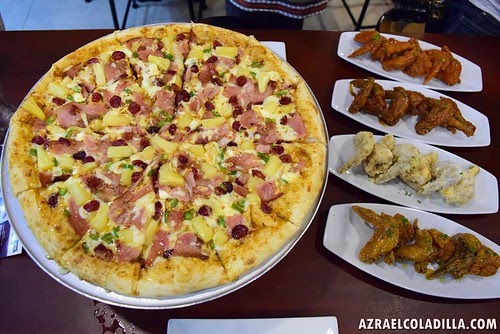 Angel’s Pizza introduces the new pizza and chicken wings for their Holiday Treats series