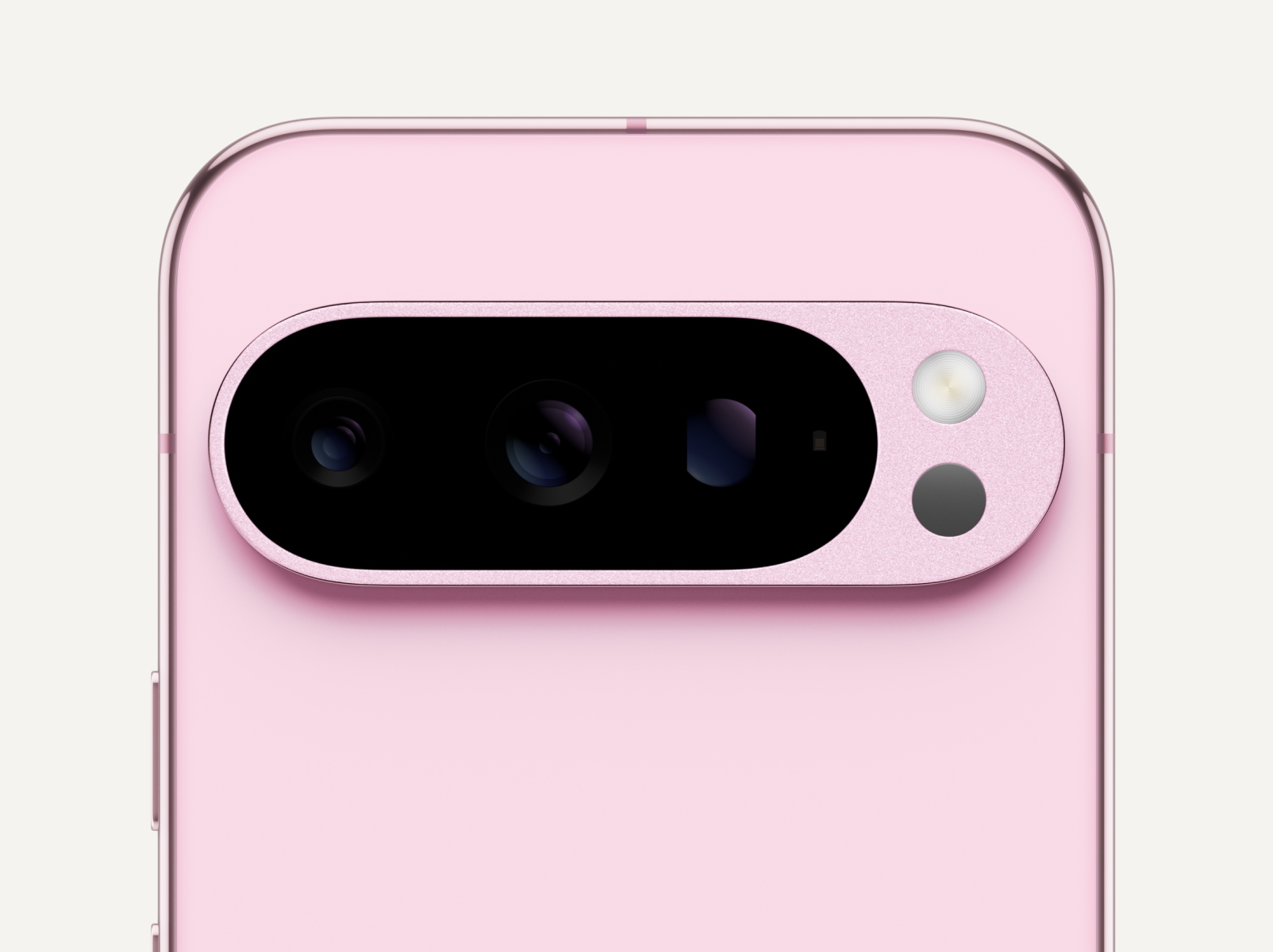 The top of Pixel 9 Pro in Rose Quartz color.