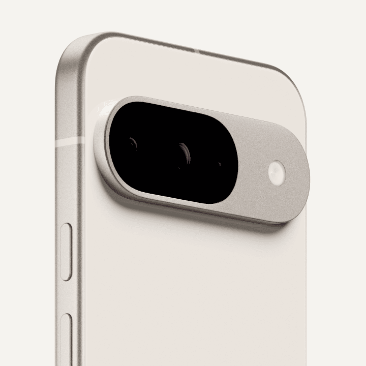 Angled close-up on the back of a Pixel 9 in Porcelain color.