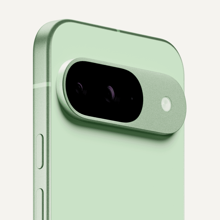 Angled close-up on the back of a Pixel 9 in Wintergreen color.