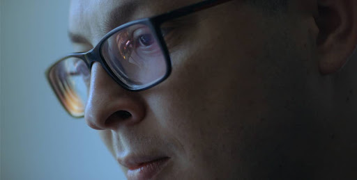 closeup of a man with spectacles