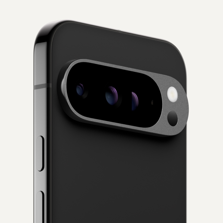 Angled close-up of the back of Pixel 9 Pro in Obsidian color.