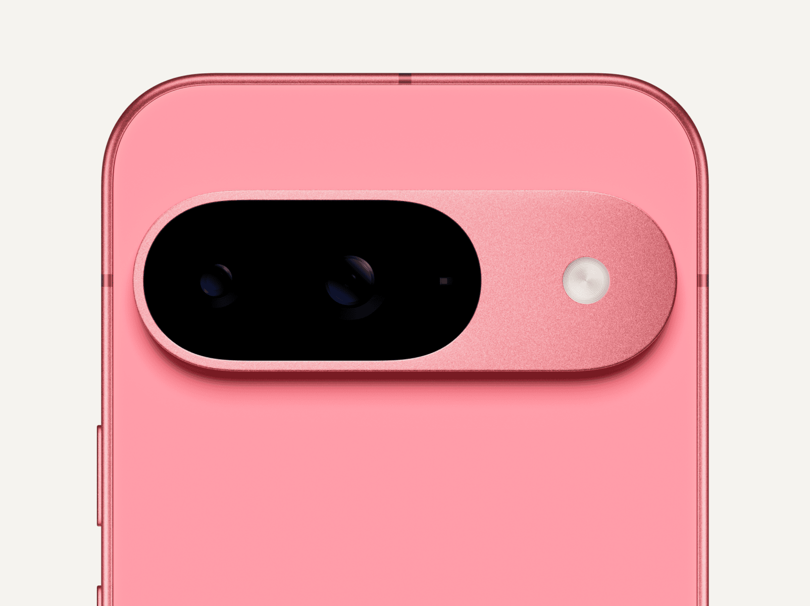 Close-up on the back of a Pixel 9 in Peony color.