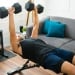 guy benching in his living room