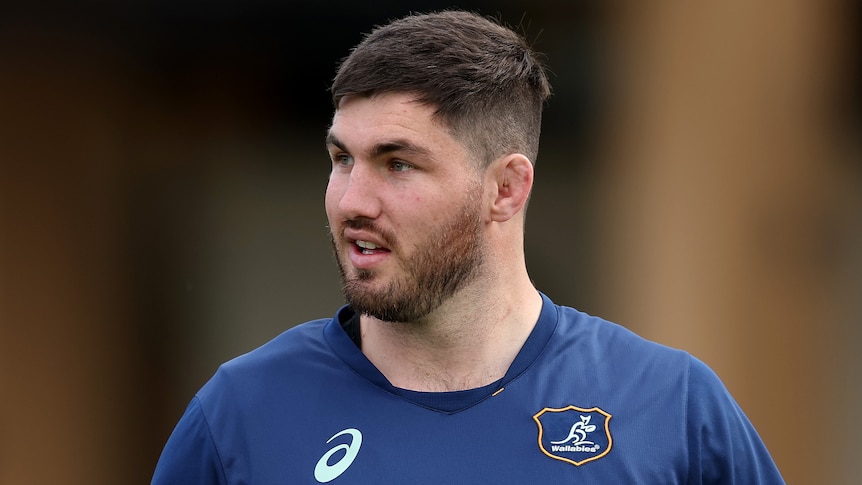 Liam Wright looks to his right at a Wallabies training session.