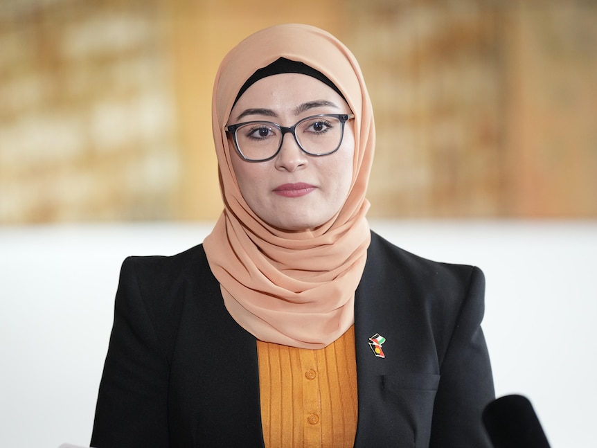 Senator Fatima Payman stands in front of a media pack in Parliament House to announce she's quitting the Labor Party.