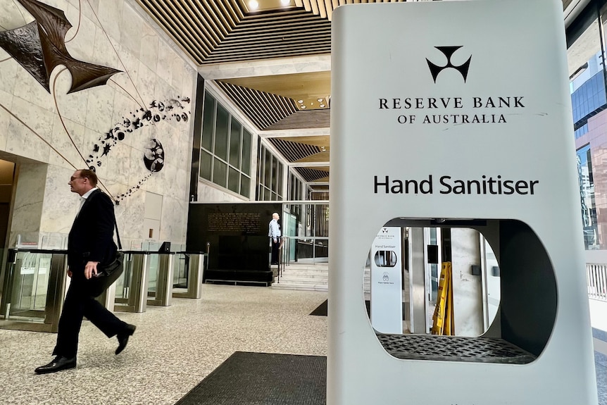 An RBA logo on hand sanitiser in the foyer at the Reserve Bank of Australia headquarters