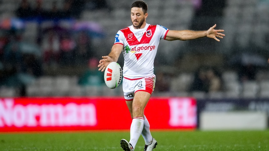 Ben Hunt prepares to kick the ball with his right foot.