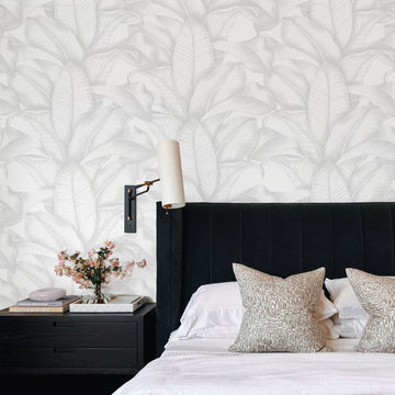 bedroom wallpaper with banana leaves in light grey