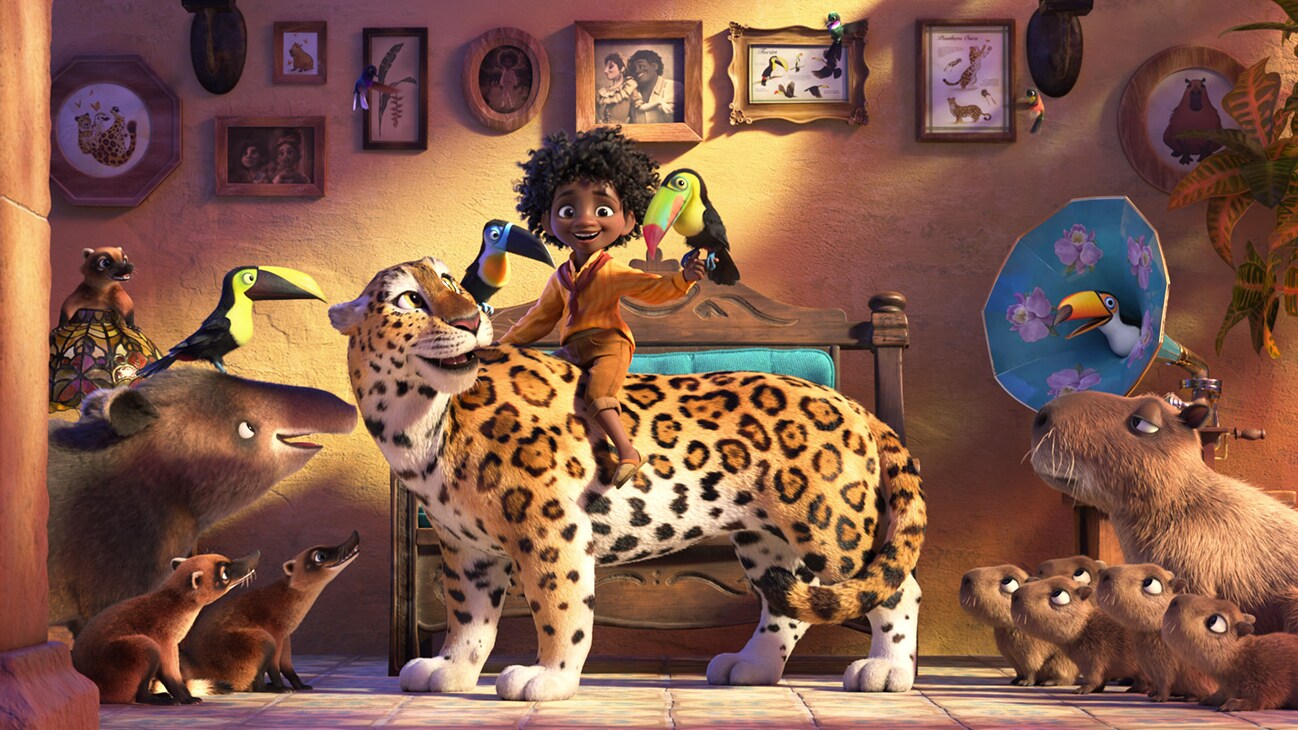 Image of a Antonio sitting on top of a cheetah from the Disney movie Encanto.