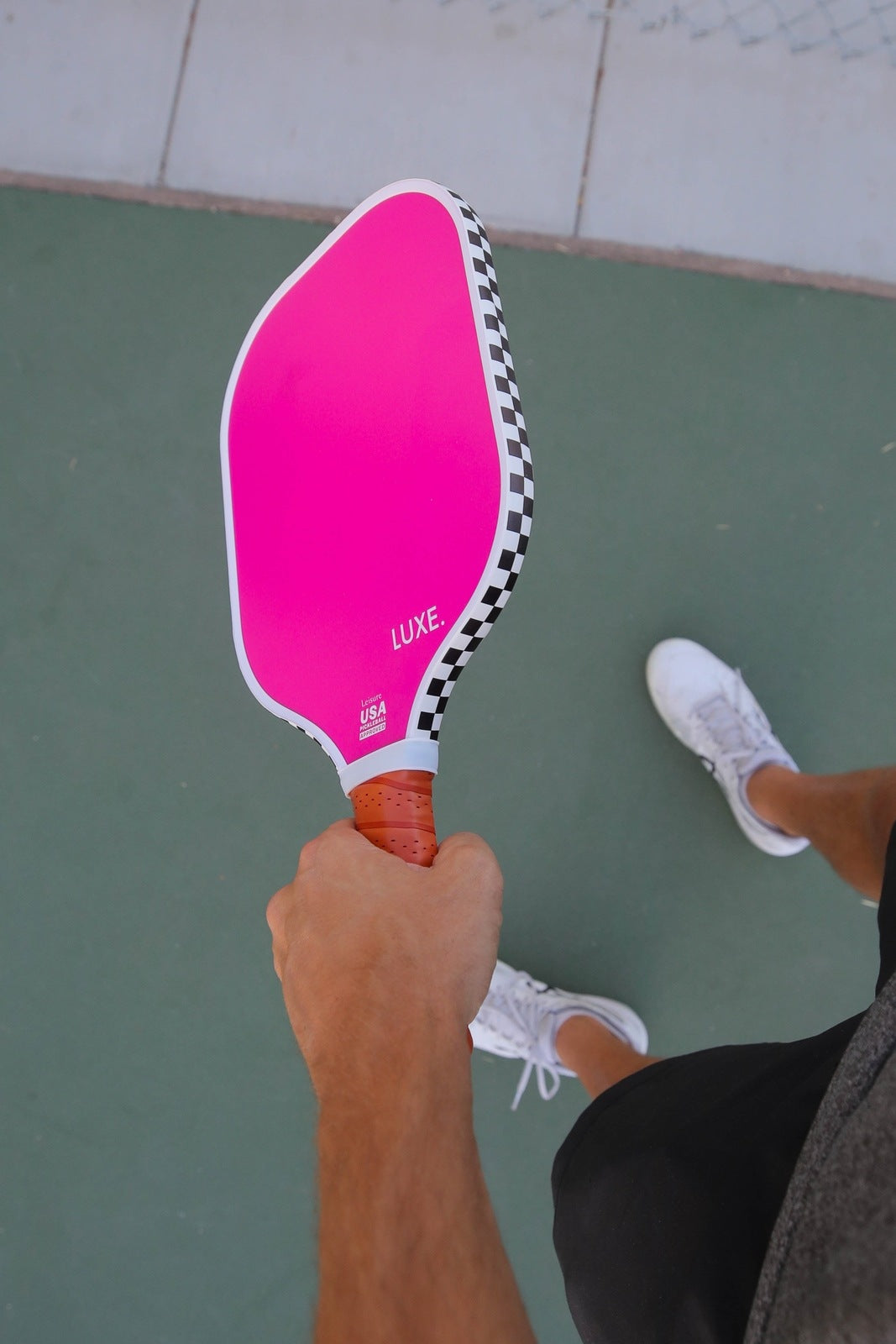 Pin pickleball paddle with checker edge guard tape