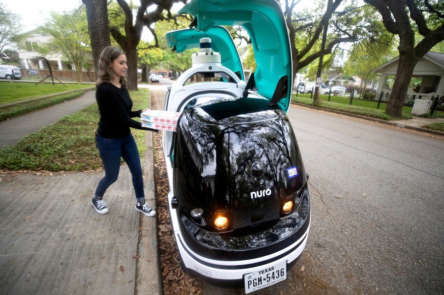 Domino's self-driving delivery robot in action.