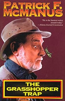 Paperback The Grasshopper Trap Book