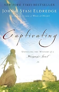 Paperback Captivating: Unveiling the Mystery of a Women's Soul Book