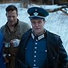 Jakob Cedergren, August Diehl, Johannes Kuhnke, and Sarah-Sofie Boussnina in The Birdcatcher (2019)