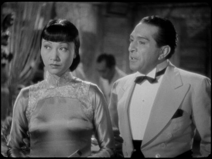 J. Carrol Naish and Anna May Wong in Island of Lost Men (1939)