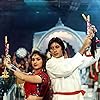 Amitabh Bachchan and Meenakshi Sheshadri in Akayla (1991)