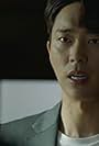 Yoon Hyun-min in Tunnel (2017)