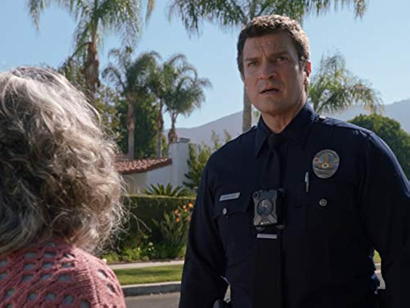 Nathan Fillion and Jayne Taini in The Rookie (2018)