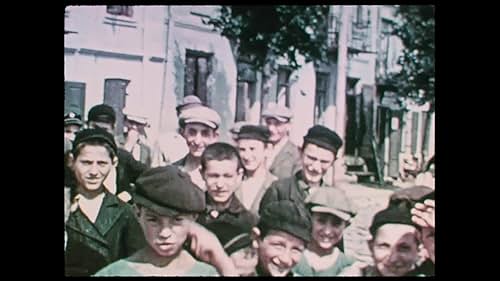 Presents a home movie shot by David Kurtz in 1938 in a Jewish town in Poland and tries to postpone its ending. As long as we are watching, history is not over yet. The three minutes of footage, mostly in color, are the only moving images left of the Jewish inhabitants of Nasielsk before the Holocaust. The existing three minutes are examined to unravel the human stories hidden in the celluloid.