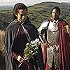 Angel Coulby and Tomiwa Edun in Merlin (2008)