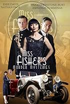 Essie Davis, Nathan Page, and Hugo Johnstone-Burt in Miss Fisher's Murder Mysteries (2012)