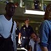 Matt Corboy, Catherine Dent, Michael Jace, and Omar McClinton in The Shield (2002)