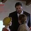 Jake Dinwiddie, John Rhys-Davies, and Katie Volding in Au Pair (1999)