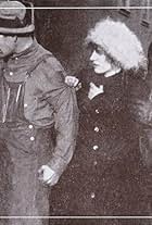 Helen Holmes and Leo D. Maloney in The Escape on the Fast Freight (1915)