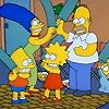 Julie Kavner, Nancy Cartwright, Dan Castellaneta, and Yeardley Smith in The Simpsons (1989)