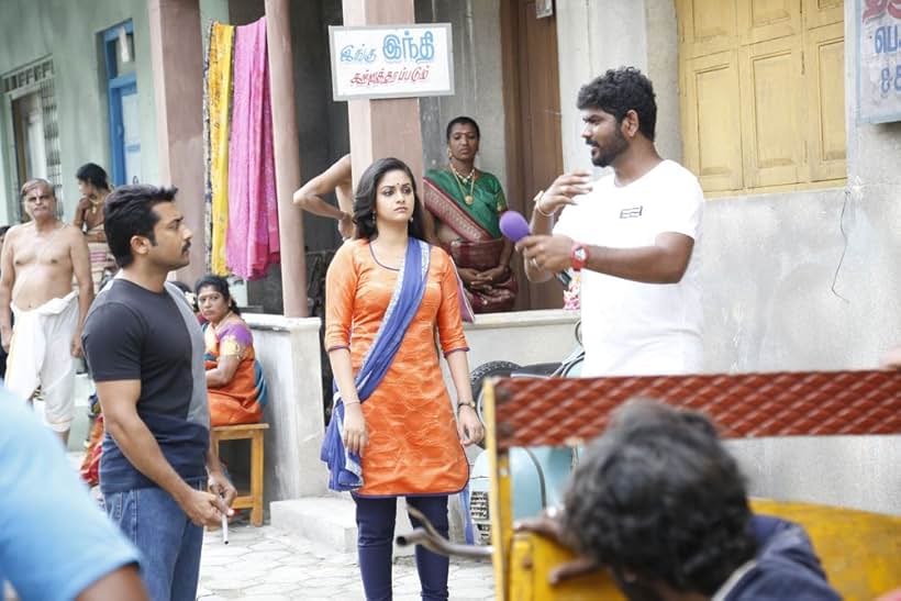 Suriya, Vignesh Shivan, and Keerthy Suresh in Thaanaa Serndha Koottam (2018)